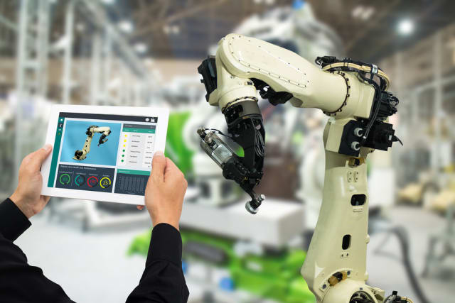 How AI Is Shaping Industry 4.0: Smarter Factories of the Future